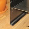 Custom steel bent plate table details with raw steel finish bent plate tables